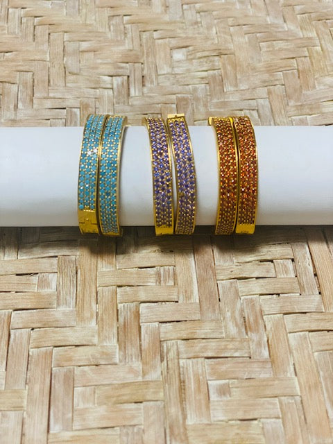 Hoops with colored zircons